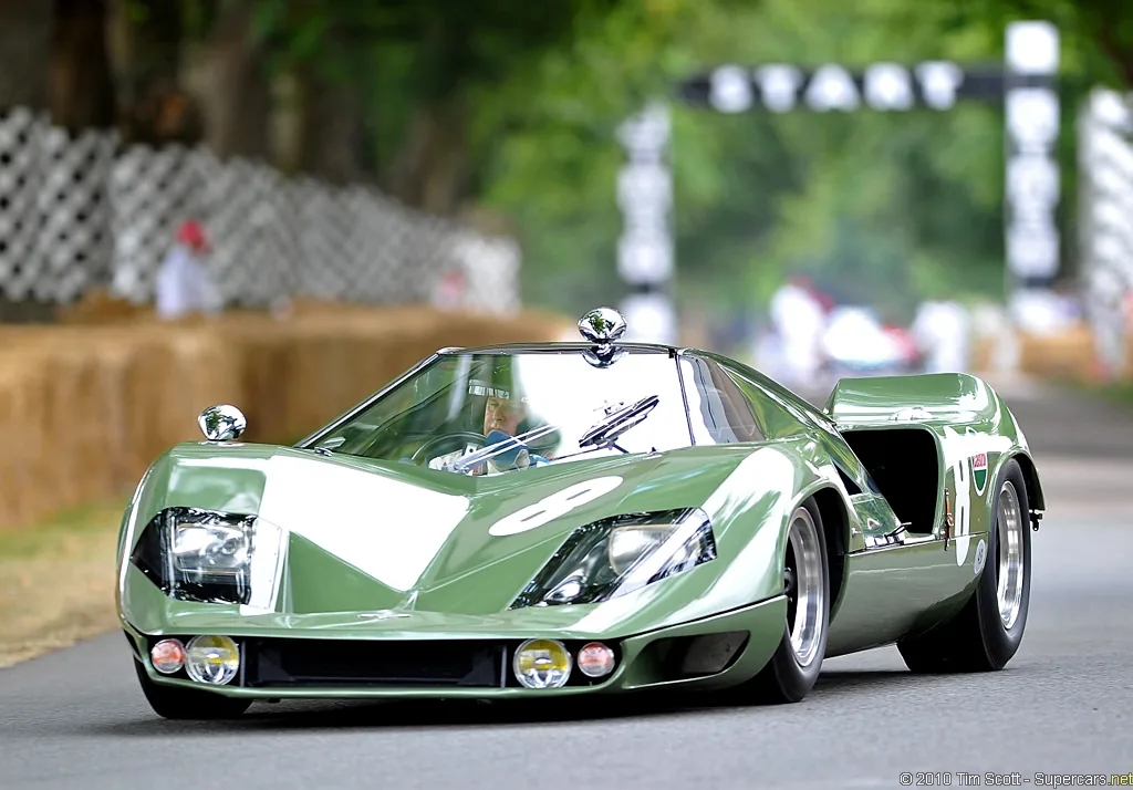 The Marcos Mantis XP photographed front three-quarter at Goodwood, with the start gantry behind